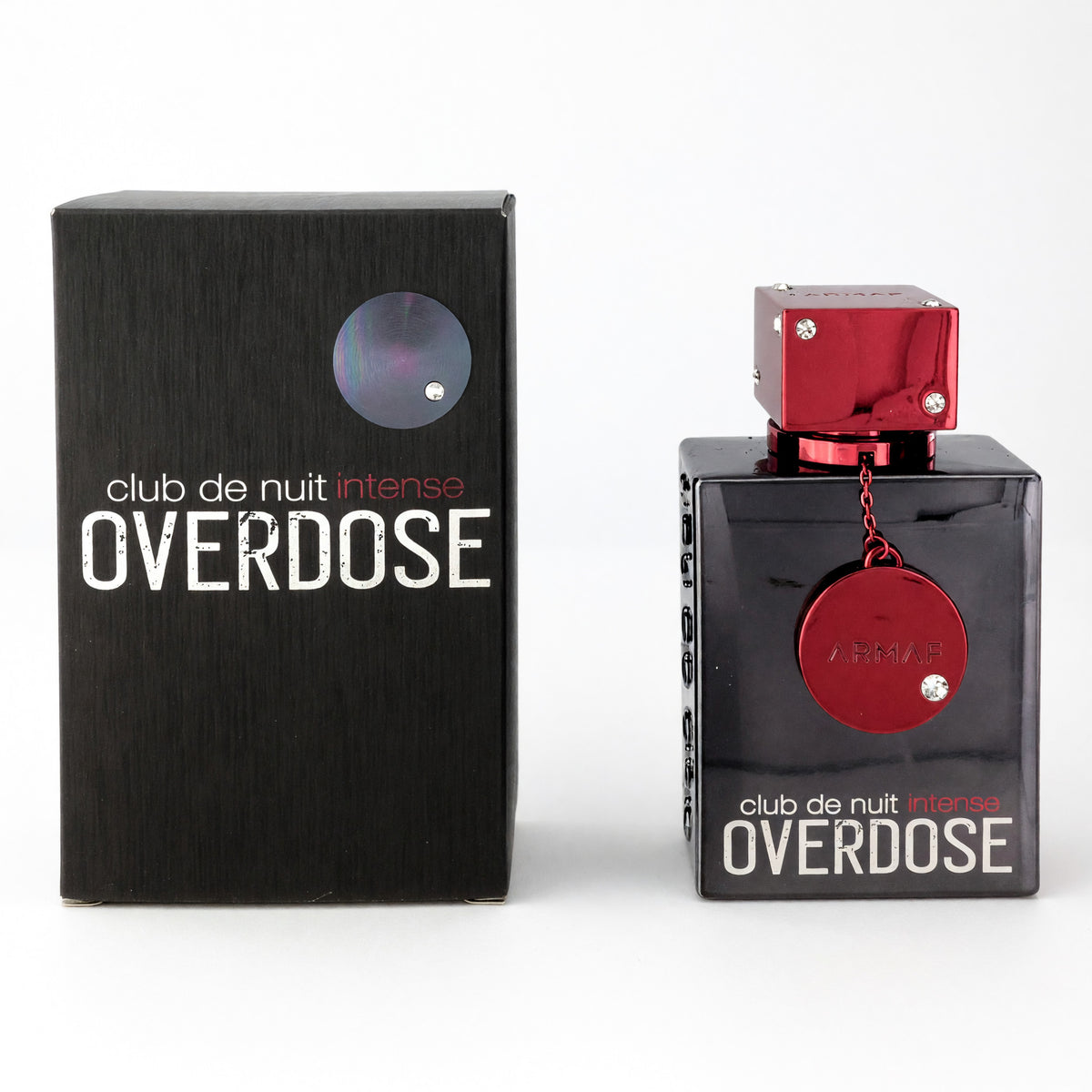 Armaf Club De Nuit Intense Overdose perfume bottle and black box, with red cap and hanging tag