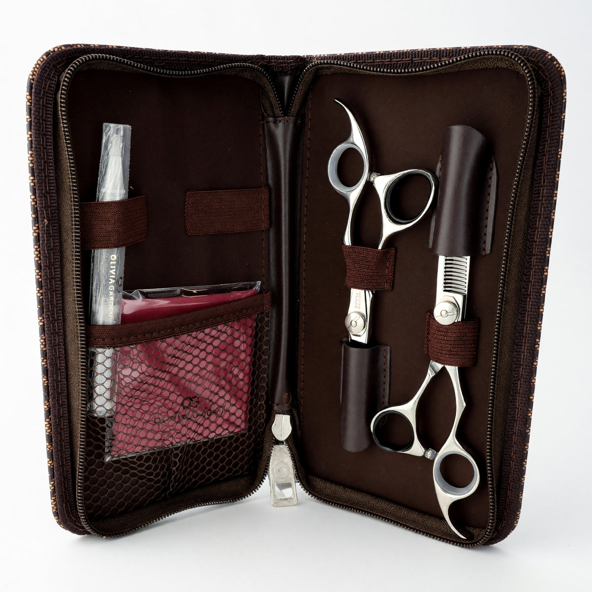 Olivia Garden shear and thinner set in open brown case with 9 cutting tools