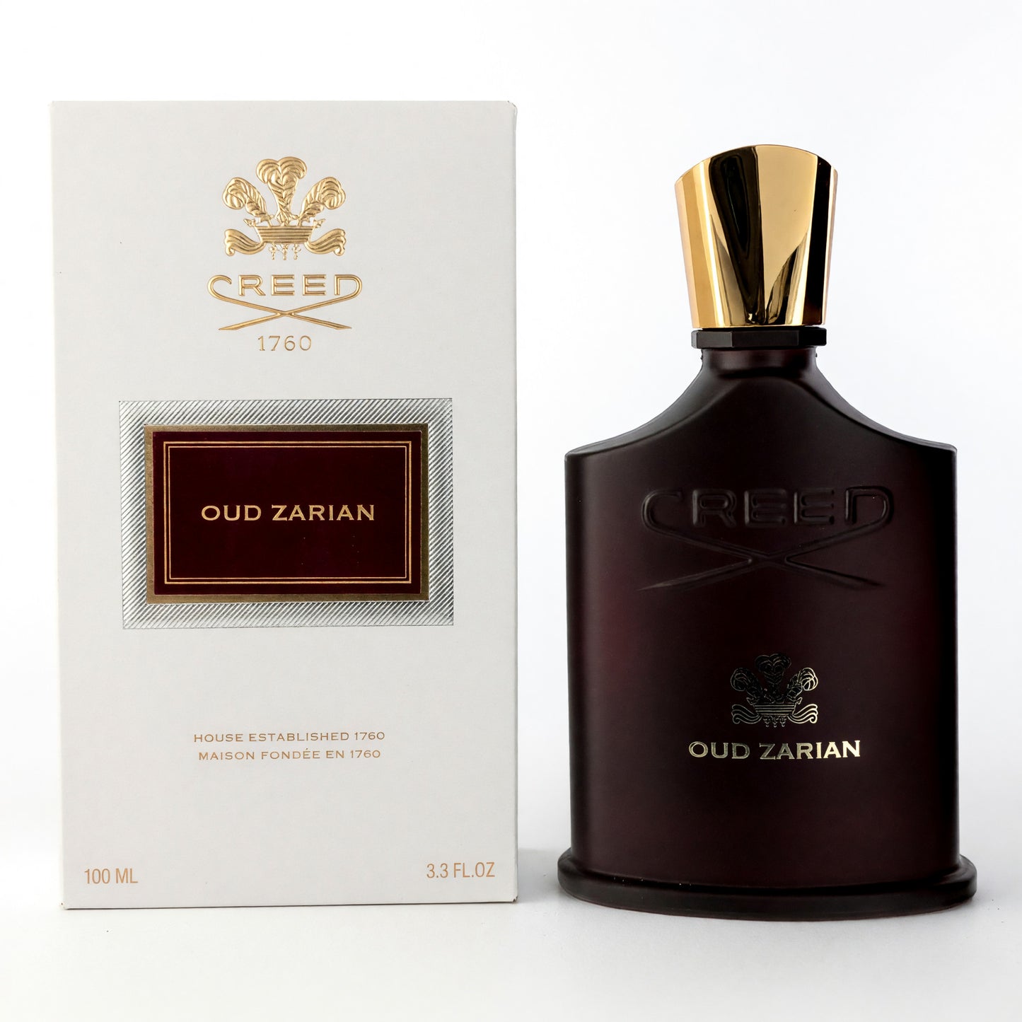 EDP perfume bottle with gold cap and dark glass, with Oud Zarian box