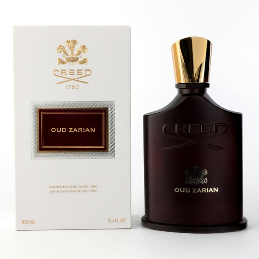 EDP perfume bottle with gold cap and dark glass, with Oud Zarian box