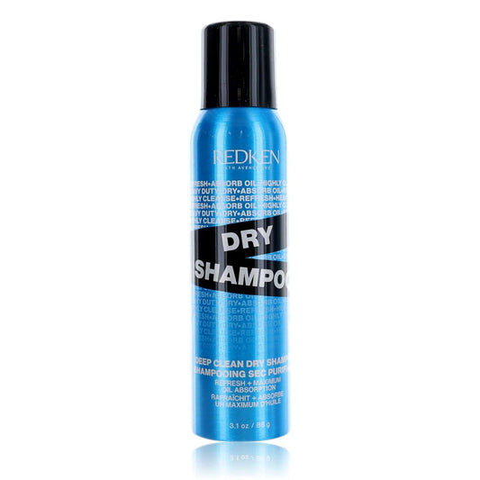 Dry shampoo bottle with black cap, blue body; Redken Dry Shampoo label