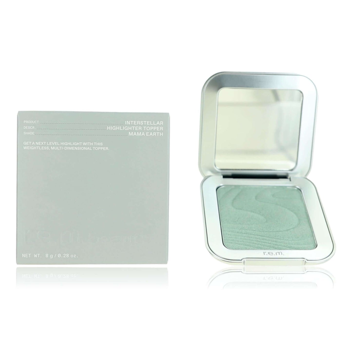 Compact highlighter topper in open case, pale mint shimmer powder surface