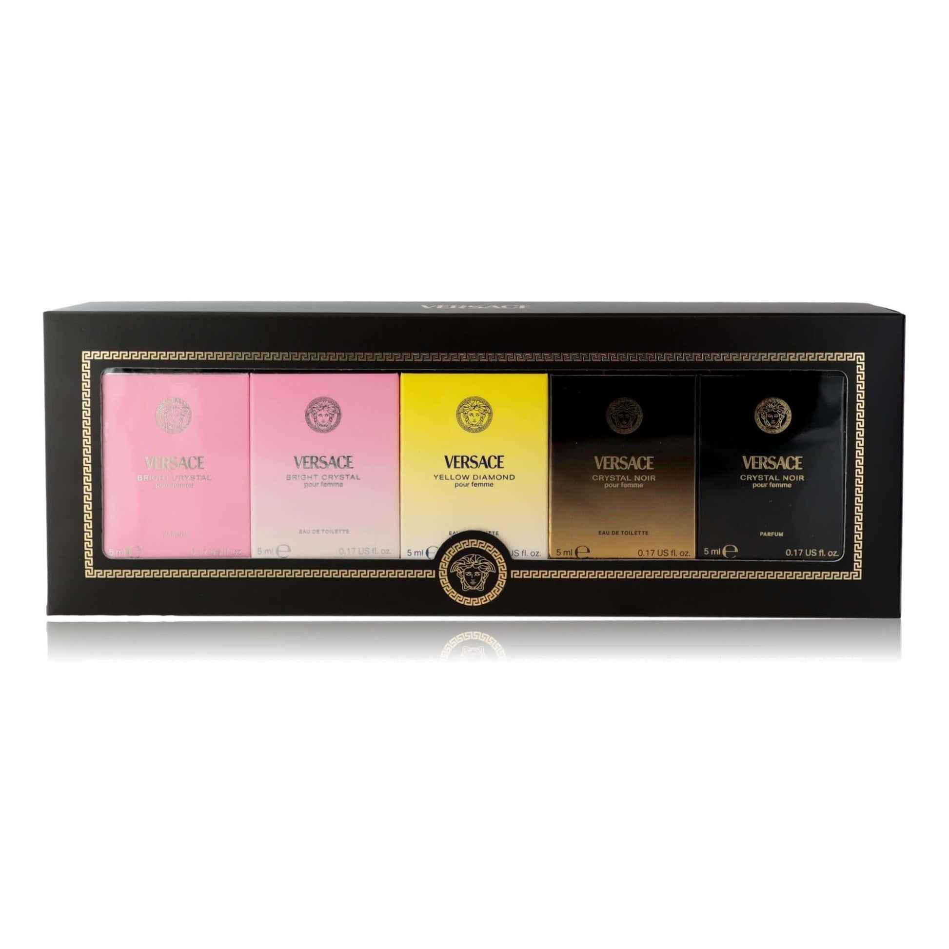 Perfume miniatures set box with five labeled bottles, dark and gold design