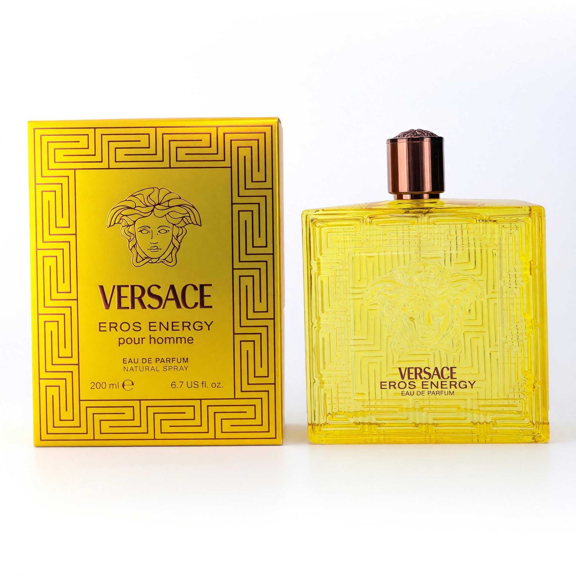 Versace Eros Energy eau de parfum spray bottle with yellow-gold glass and box
