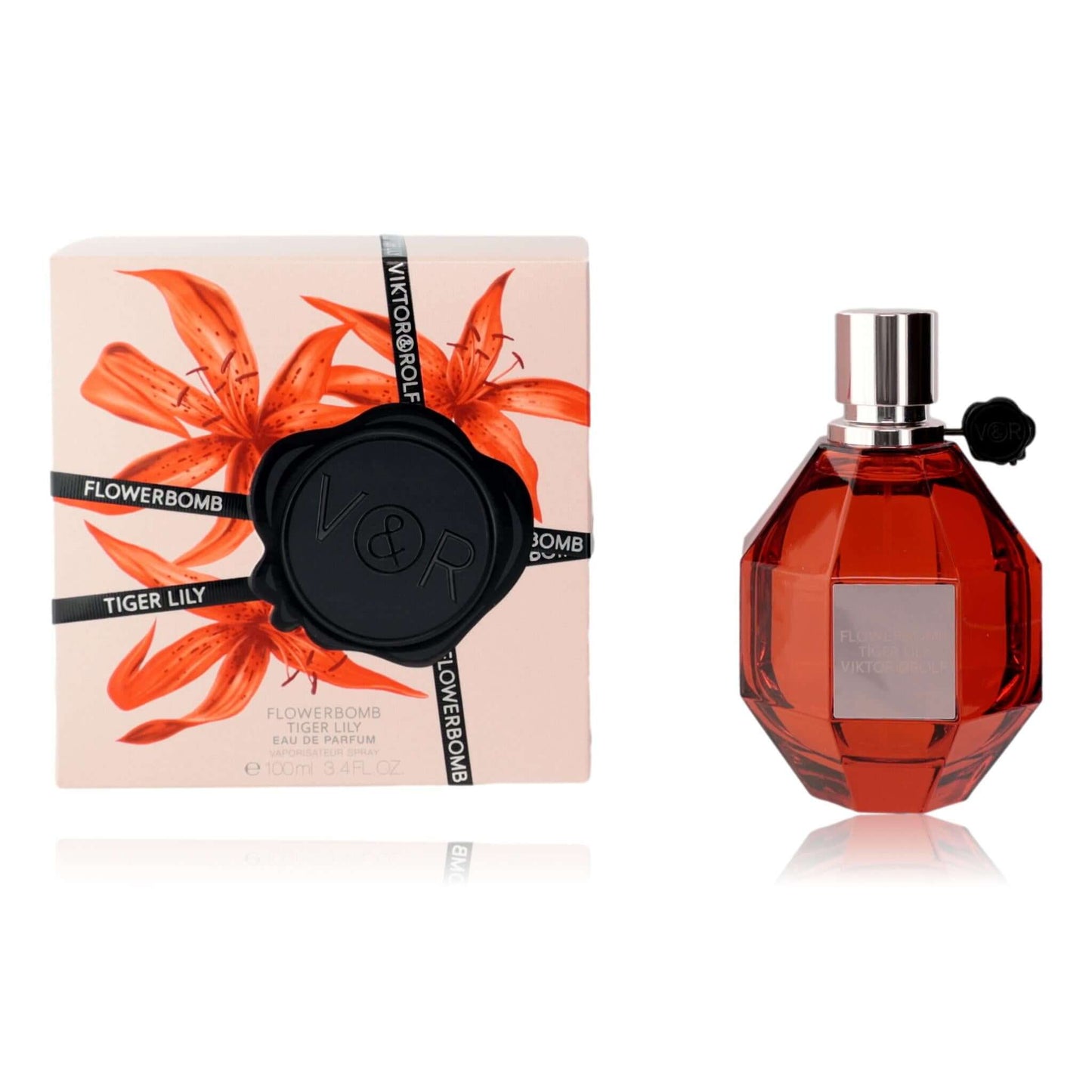 Tiger lily eau de parfum spray bottle with matching gift box, red glass and black cap