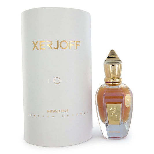 Xerjoff Newcleus EDP spray with amber bottle and gold cap beside white cylinder box