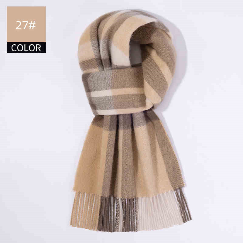Plaid scarf with beige, brown, and white colors on a white background