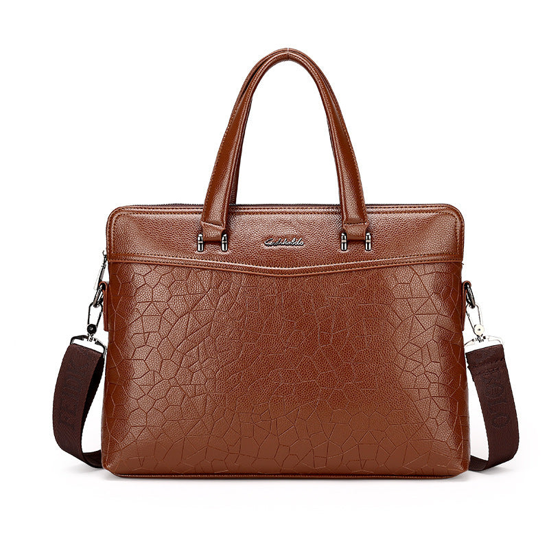Brown leather briefcase with textured geometric pattern, top handles and shoulder straps