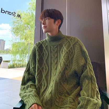 Olive green cable knit turtleneck sweater with diamond stitch pattern