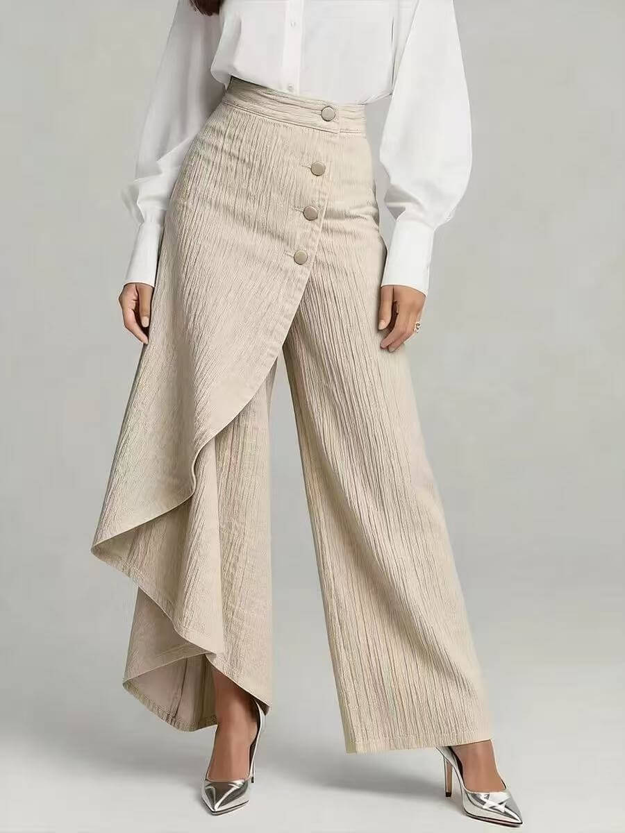 Light beige denim straight-leg pants with asymmetrical ruffle overlay and front buttons