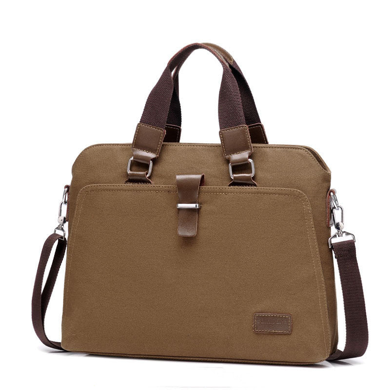 Coffee brown canvas briefcase with top handles, shoulder strap, and front buckle detail