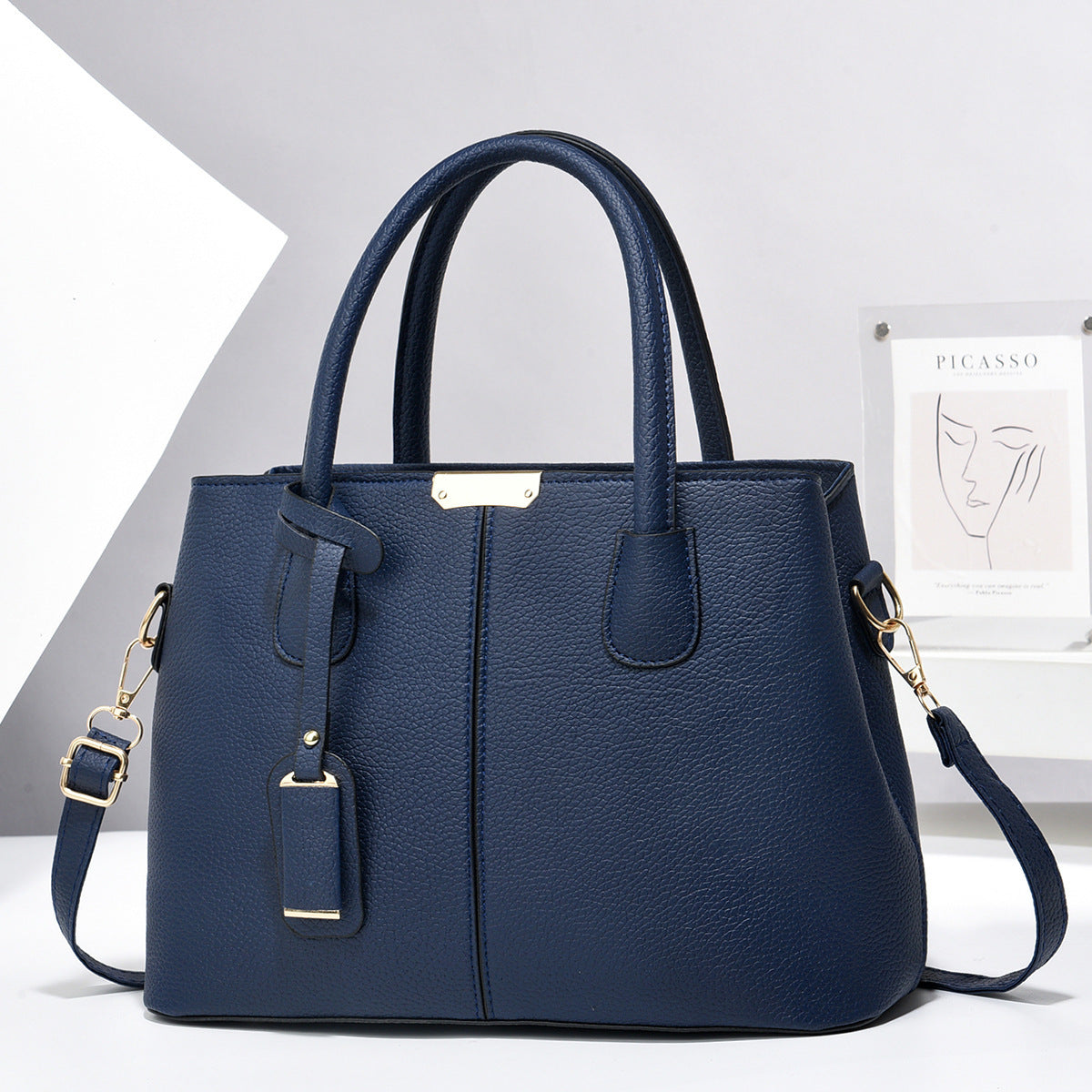 PU leather tote & crossbody bag, navy blue with dual handles and adjustable shoulder strap