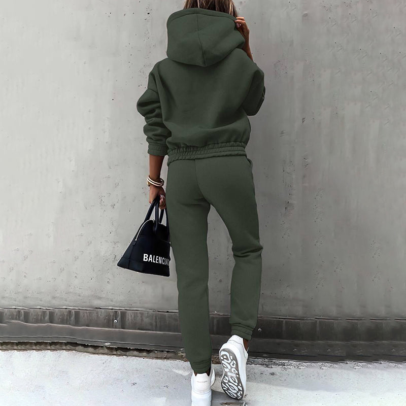 Two-piece casual tracksuit for women in dark green, back view of hooded top and joggers