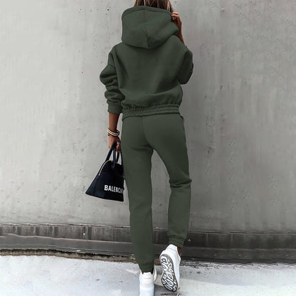 Two-piece casual tracksuit for women in dark green, back view of hooded top and joggers