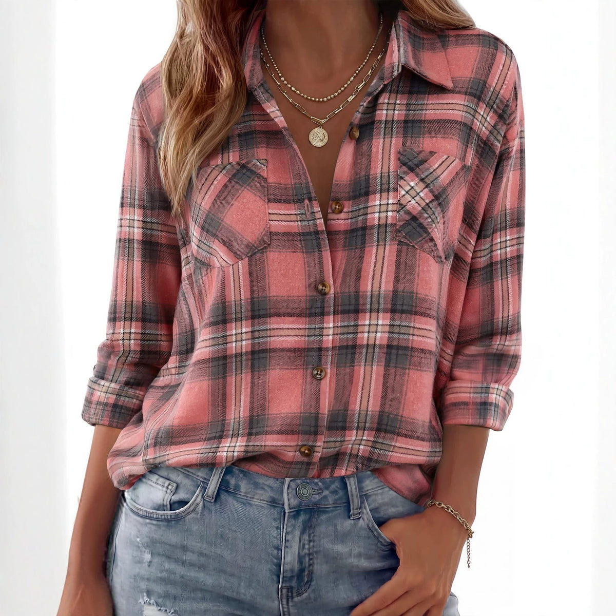 Loose-fit plaid button-up shirt in mauve and pink checks with chest pockets