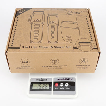 Cardboard box packaging for a 3-in-1 hair clipper and shaver set on a white background.