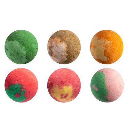 Bath bomb spheres arranged on white: green, brown, orange, red, pink, and green-pink