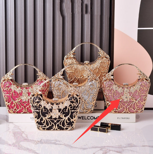 Women’s hollow out shiny clutch with rhinestone flower detail, ornate filigree, gold and pink