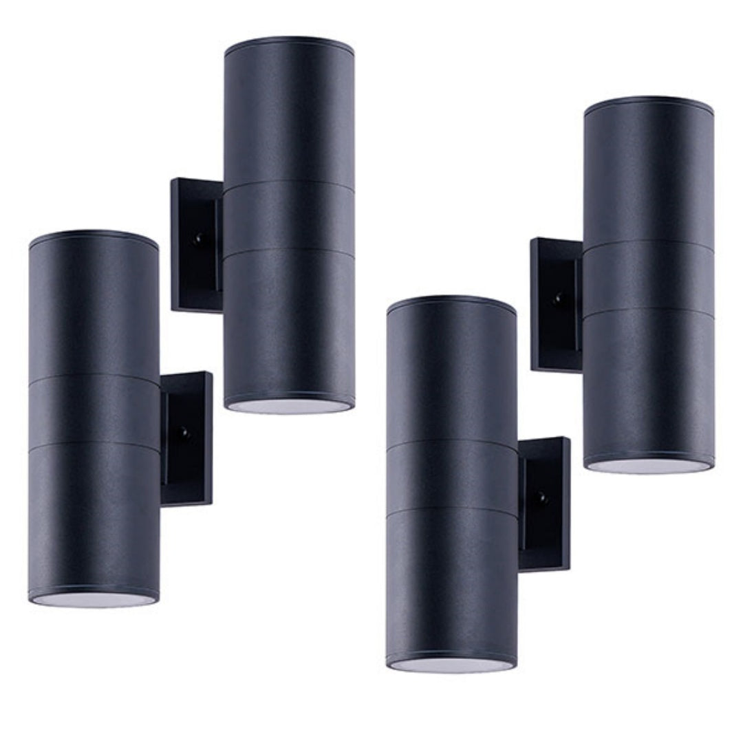 Matte black cylinder outdoor wall lights 4-pack shown with lamp housings on white