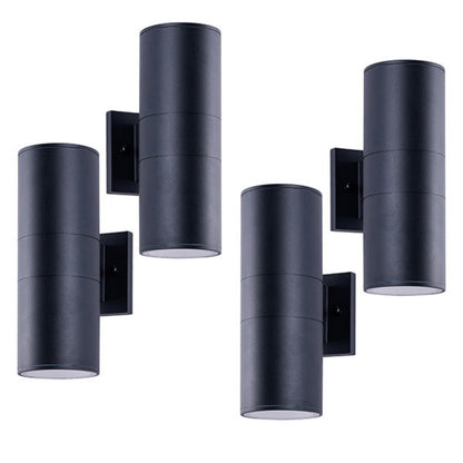 Matte black cylinder outdoor wall lights 4-pack shown with lamp housings on white