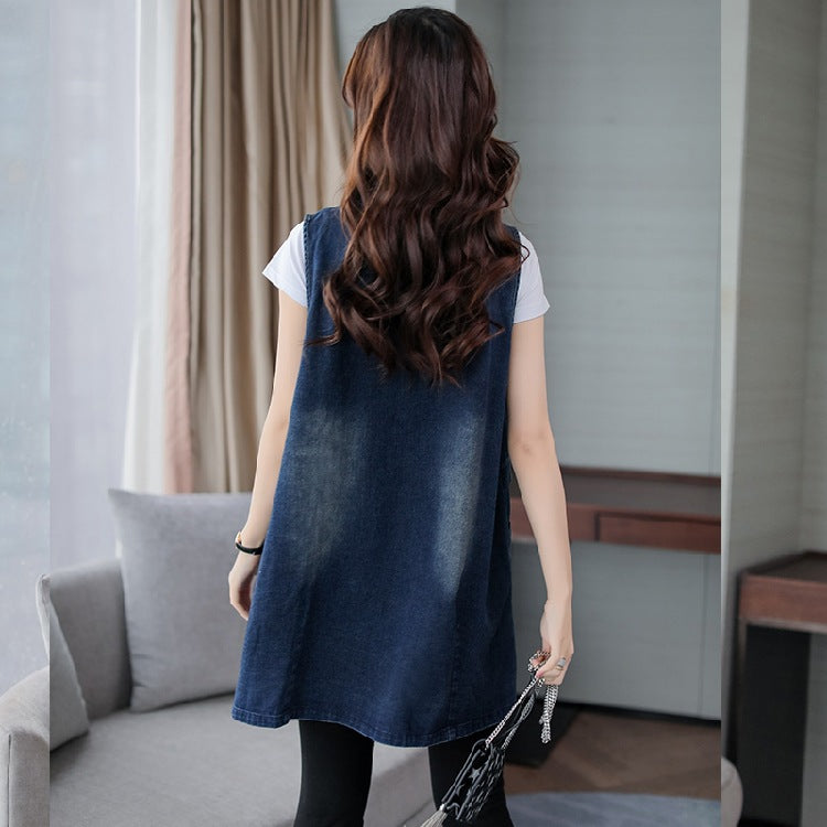 Back view denim vest coat with sleeveless cut and patch pockets