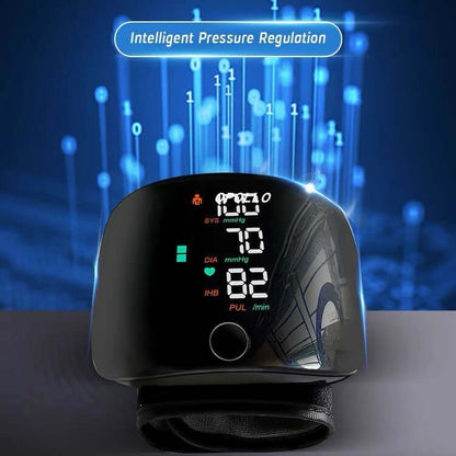 Black wrist blood pressure monitor with touch screen and numeric SYS/DIA/IBH values