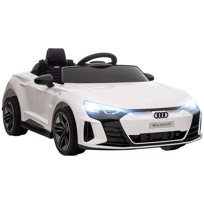 White kids ride-on car with black wheels, open-top seat, and front headlights visible