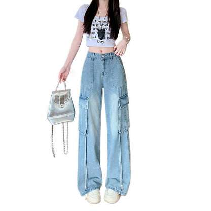Light blue wide-leg cargo jeans with multiple flap pockets and long straight hem