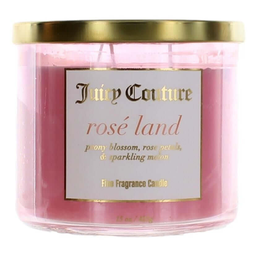 Juicy Couture scented candle in a pink glass jar with gold lid and Rose Land label