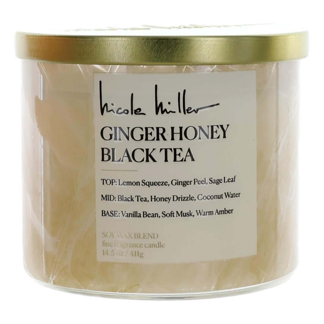 Soy wax blend candle jar with Nicole Miller label, gold lid, off-white wax