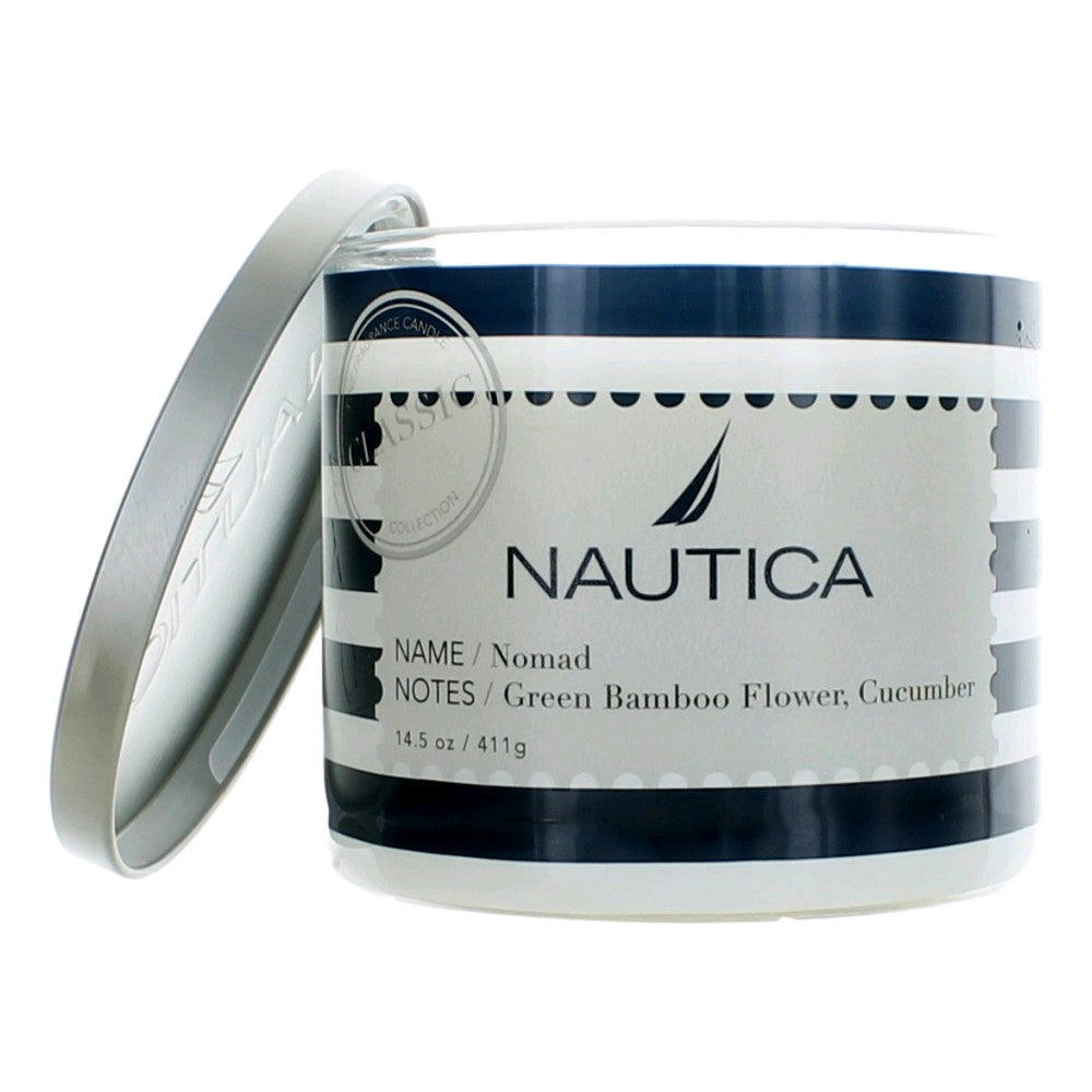 Nautica soy wax blend candle jar with blue glass and white Nomad label, lid open