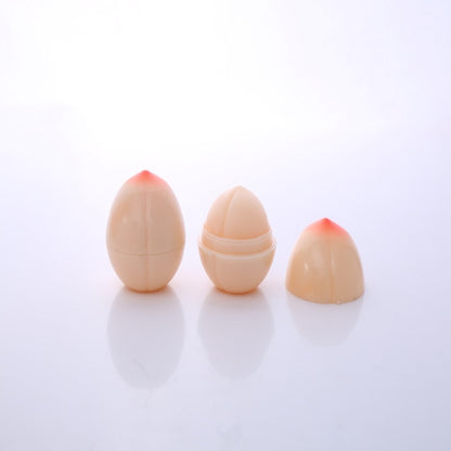 Three beige cosmetic sponges with red tips on a white background