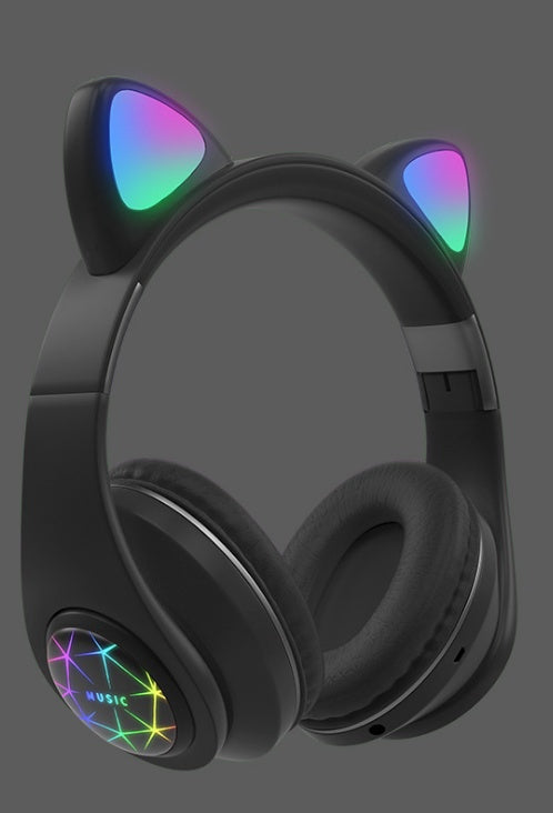 Black headphones with cat ear design and colorful LED lights on a dark background