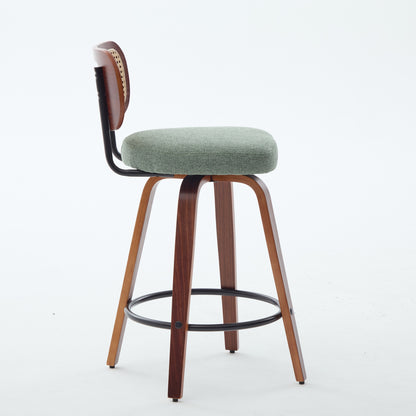 Swivel counter stool with light green seat, cane rattan back, black base, dark wood legs