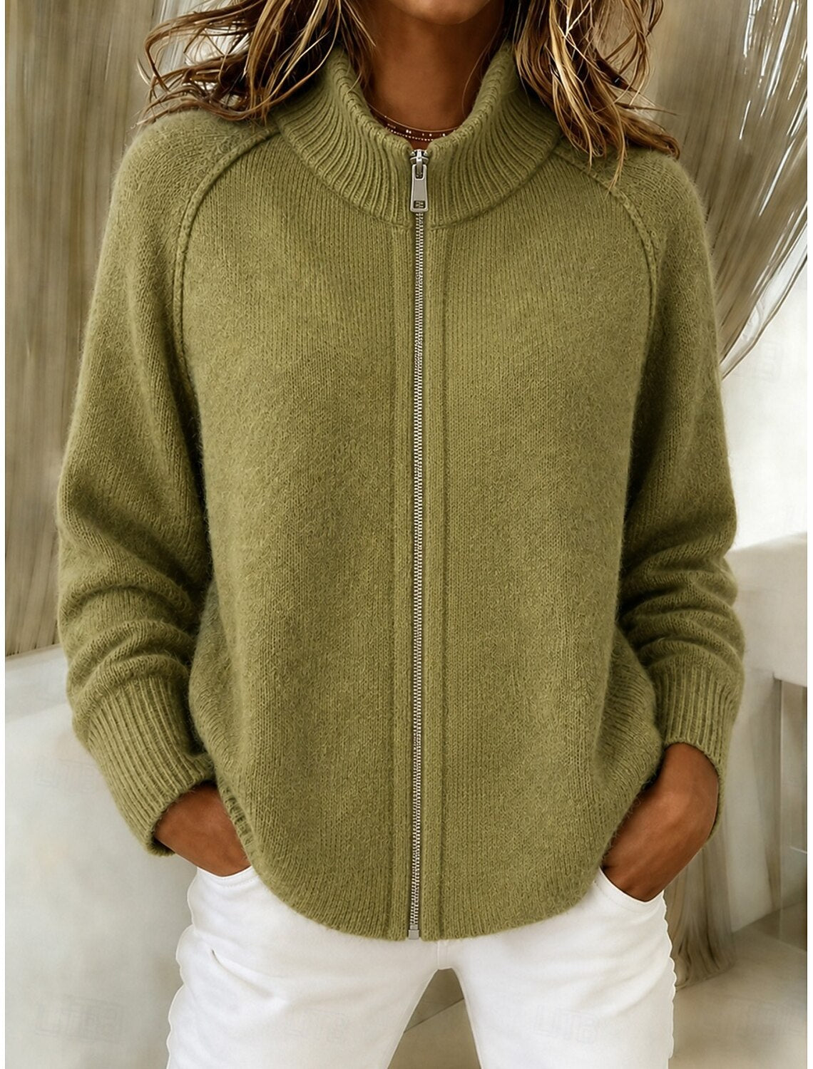 Olive green knitted cardigan with stand collar and front zipper, ribbed hem and long sleeves