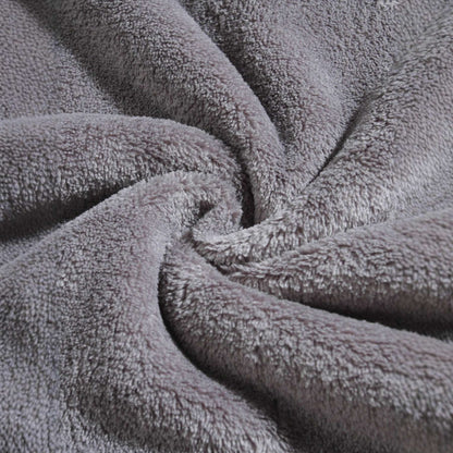 Close-up of gray fuzzy fleece fabric texture