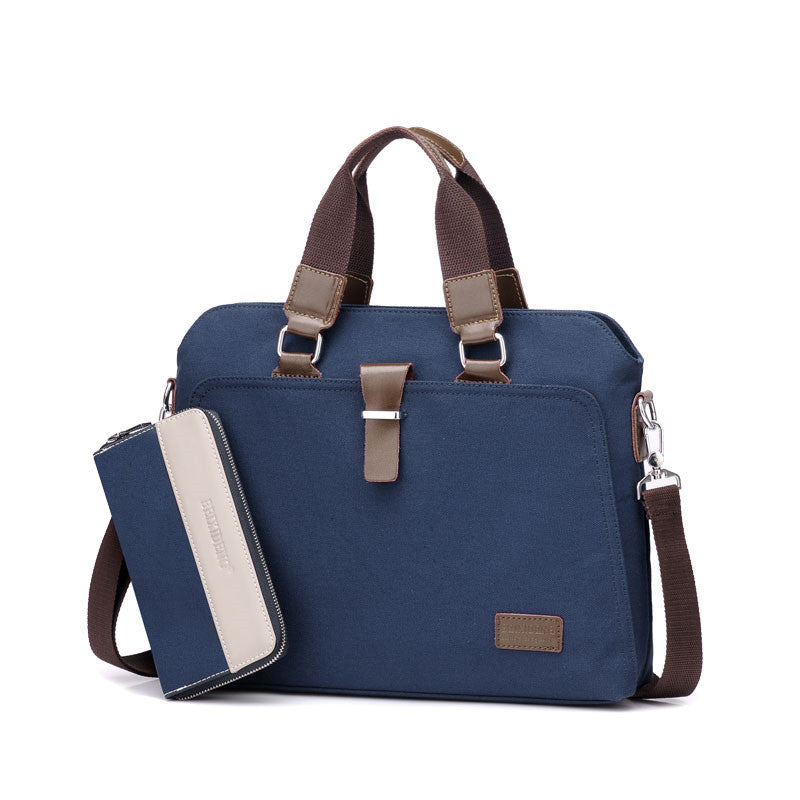 Blue canvas briefcase with top handles, shoulder strap, and a zippered card wallet pouch