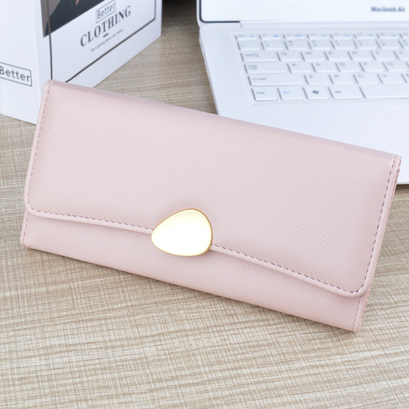 Light pink long wallet with card holder and heart-shaped snap clasp, slim foldover design