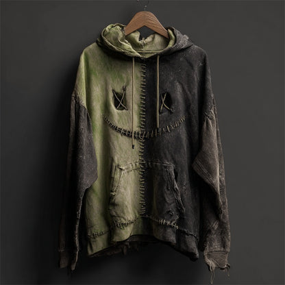Distressed hoodie with a unique design on a dark background