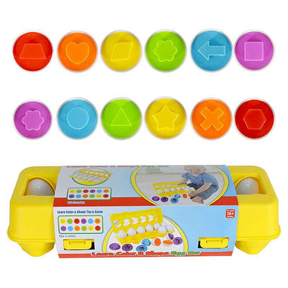 Colorful shape sorting toy with packaging on a white background