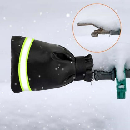Black faucet cover with neon green reflective strip over a snow-dusted outdoor spigot