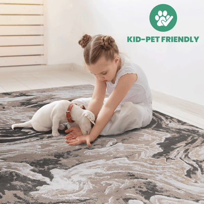 Abstract area rug with light brown, beige, and dark gray swirling pattern