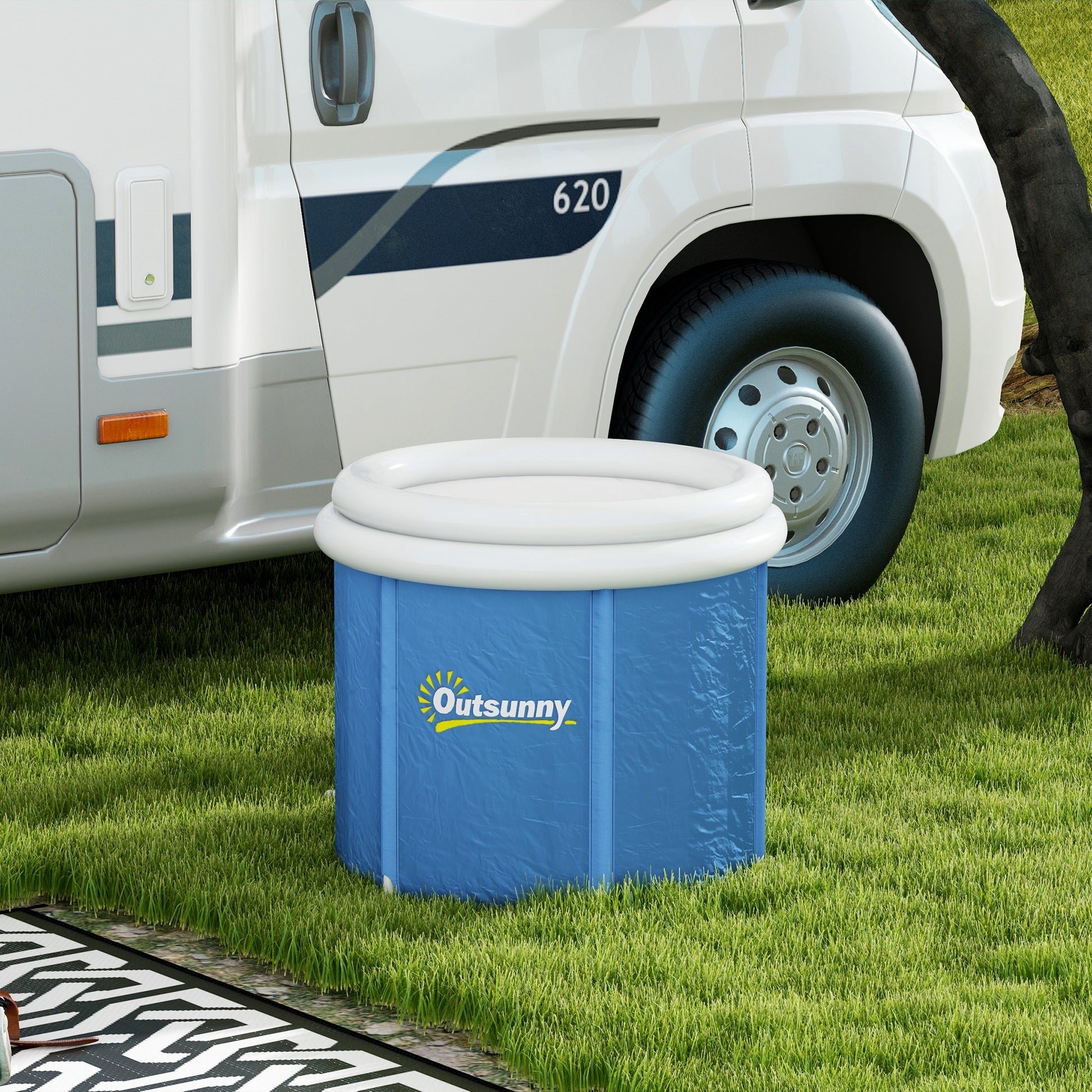 Blue cold plunge tub with white rim and support poles set up on grass