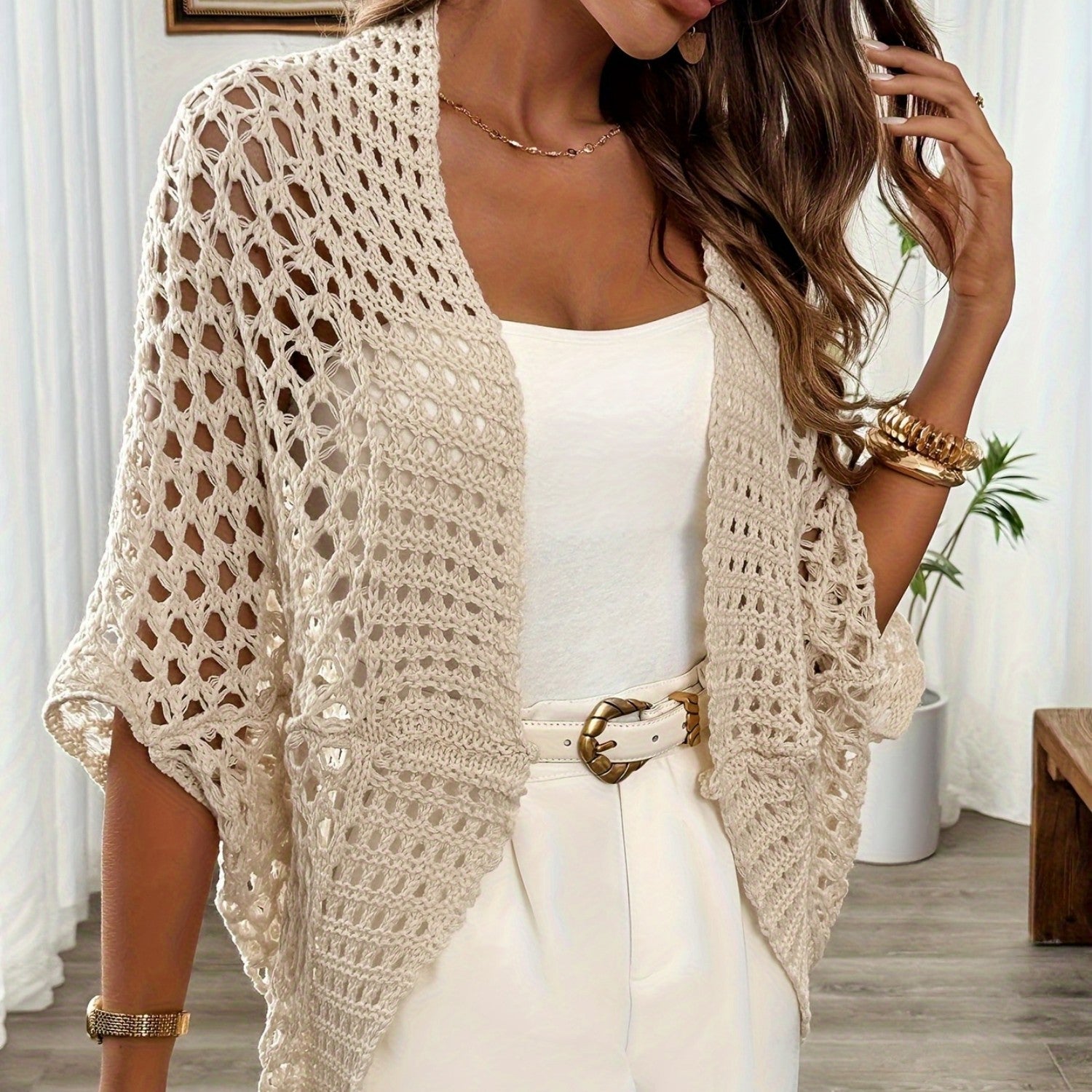 Women's khaki crochet cardigan with openwork knit and draped sleeve front