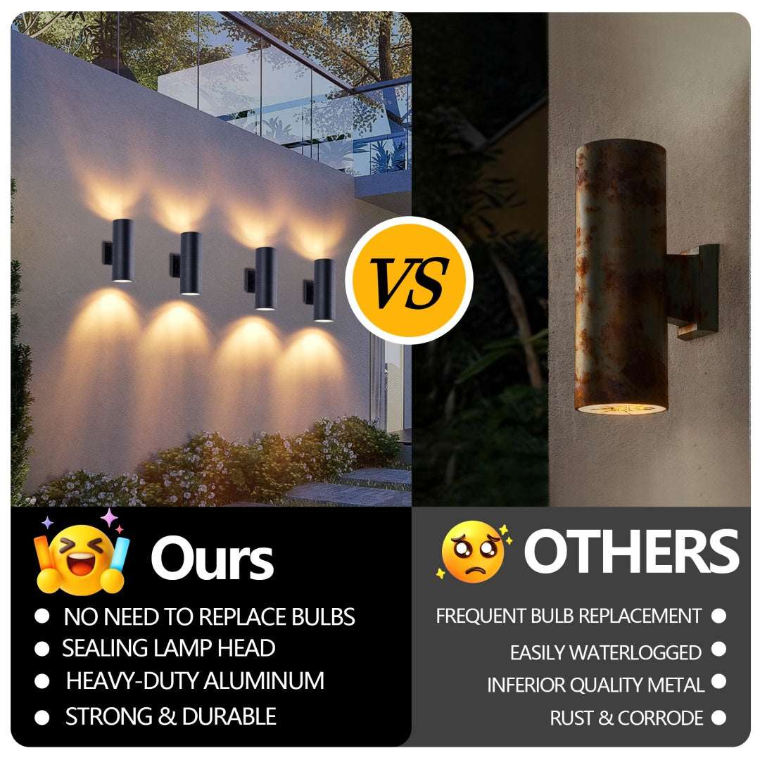 Matte black cylinder outdoor wall light next to a stained cylinder on exterior wall