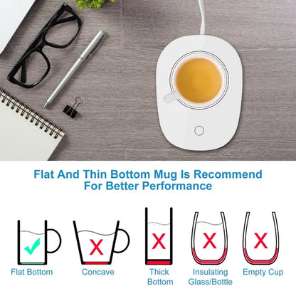 White electric cup heater base with circular heating opening and round power button.