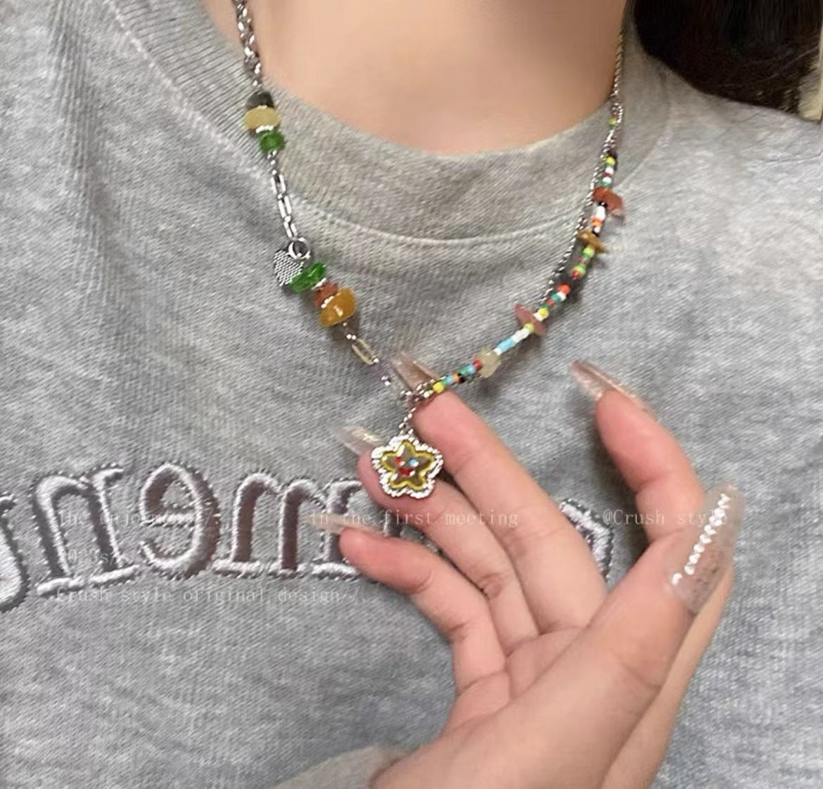 Butterfly pearl necklace with multicolor beaded strand and butterfly charm pendant