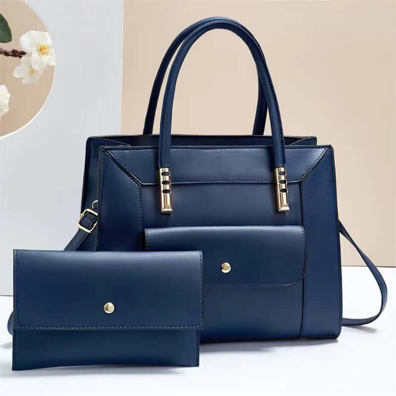 Navy blue tote bag set with top handles and matching mini crossbody bag