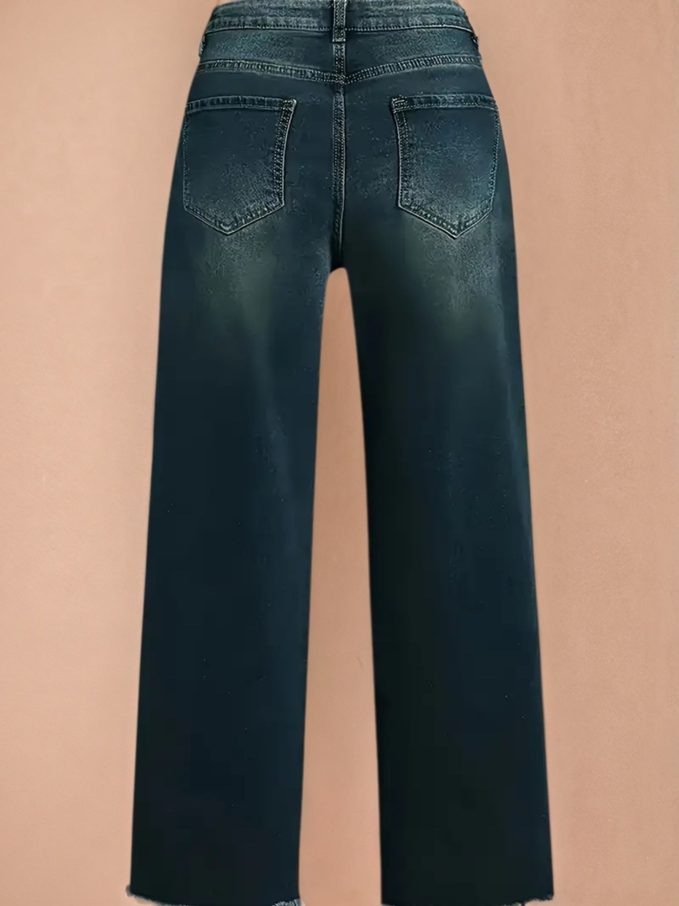 Wide-leg denim pants in dark blue wash, back pockets, belt loops, flared leg opening.