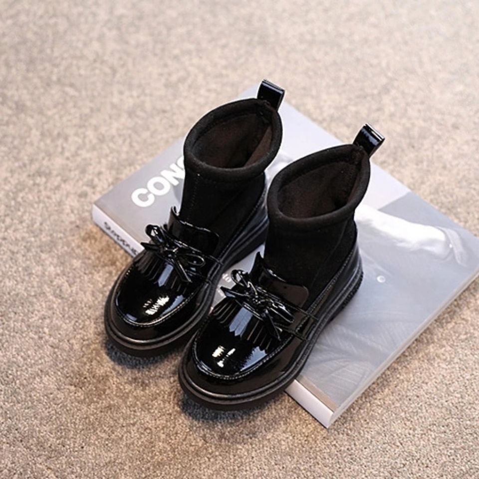 Girls’ black ankle boots with glossy faux leather front and front buckle strap